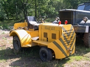 yellow Clark Airfield Tractor Tanks in Town 2008